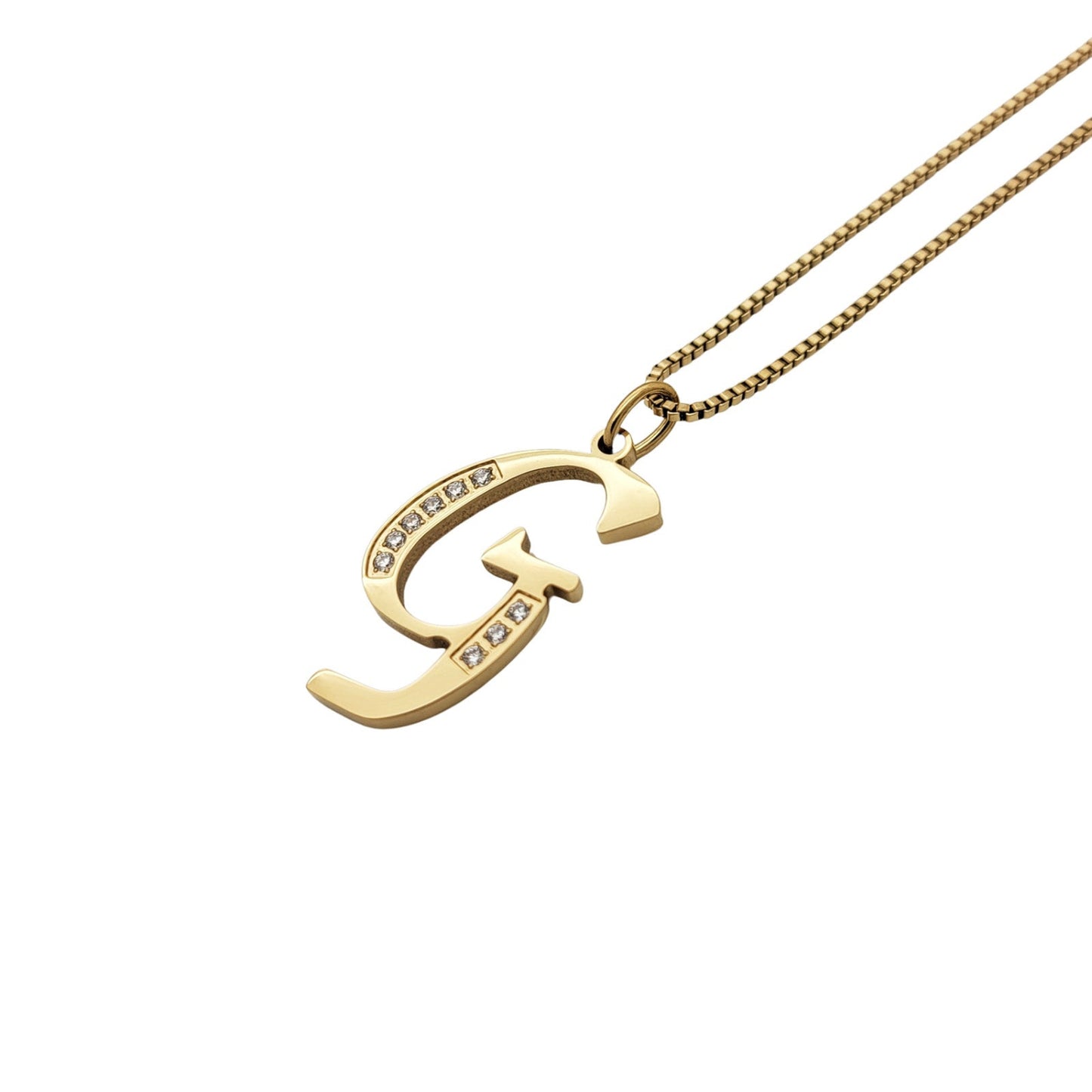 Gold necklace with a 'G' pendant on a white background