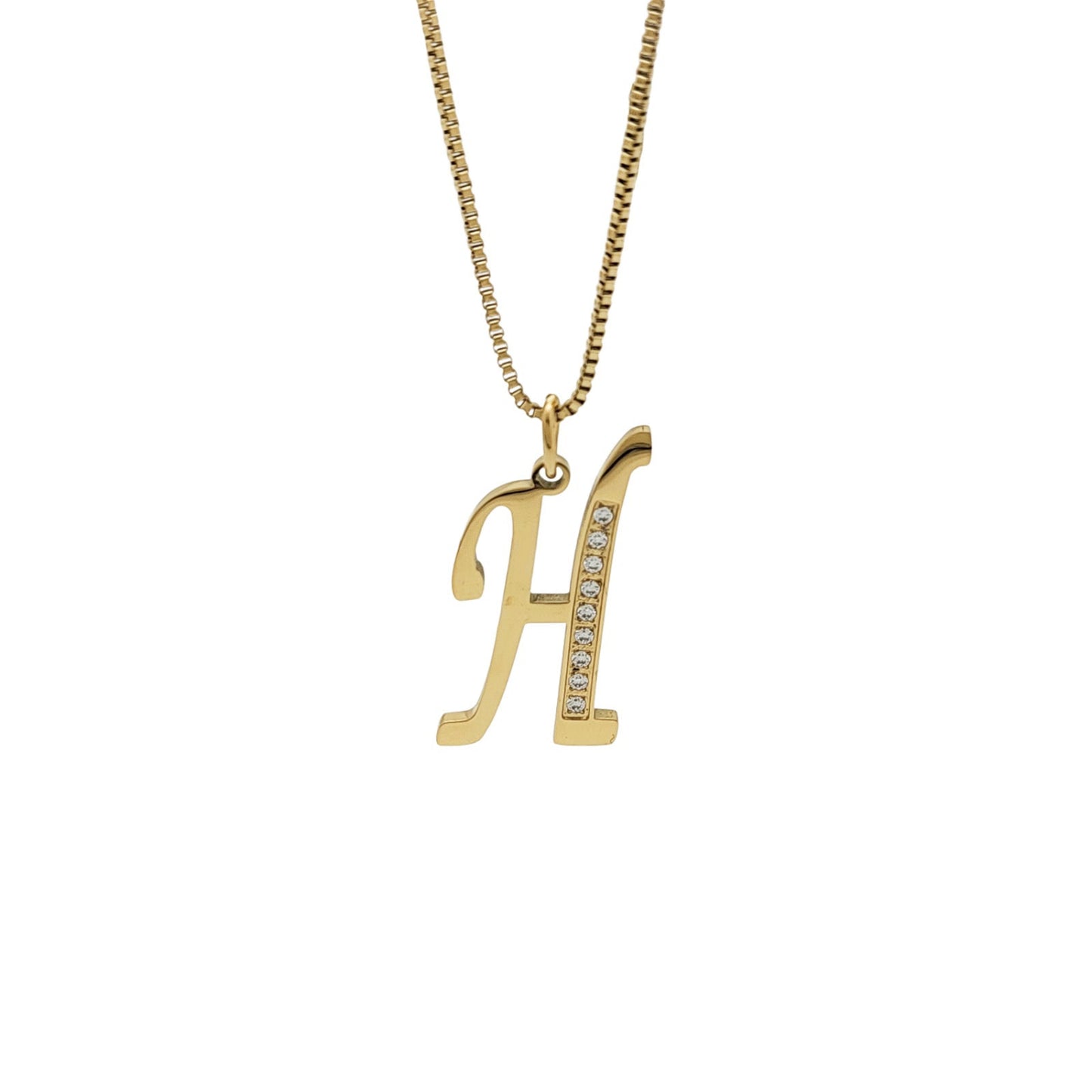 Gold necklace with 'H' pendant on a white background