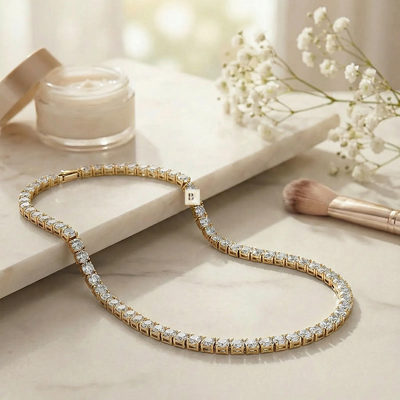 Gold Tennis necklace with diamonds on a light surface with a blurred background