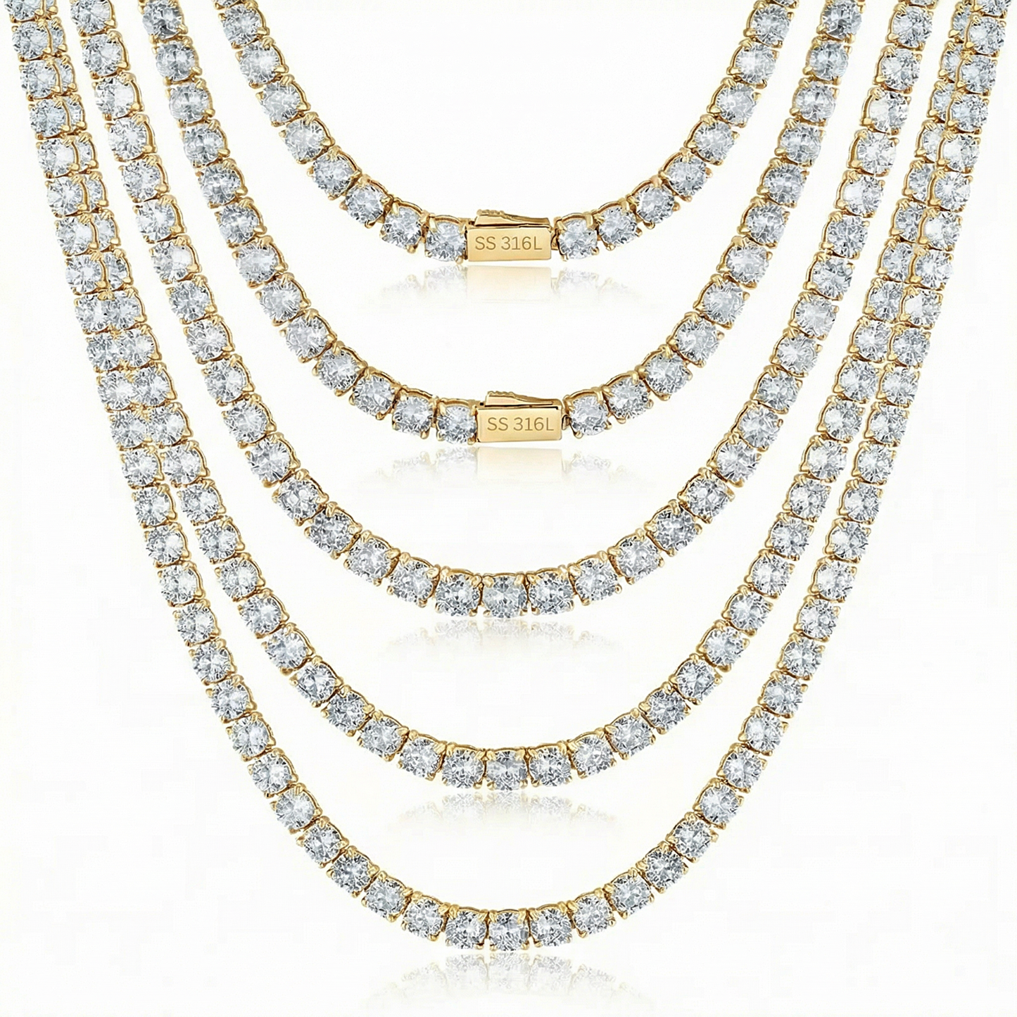 Three diamond necklaces stacked on a white background