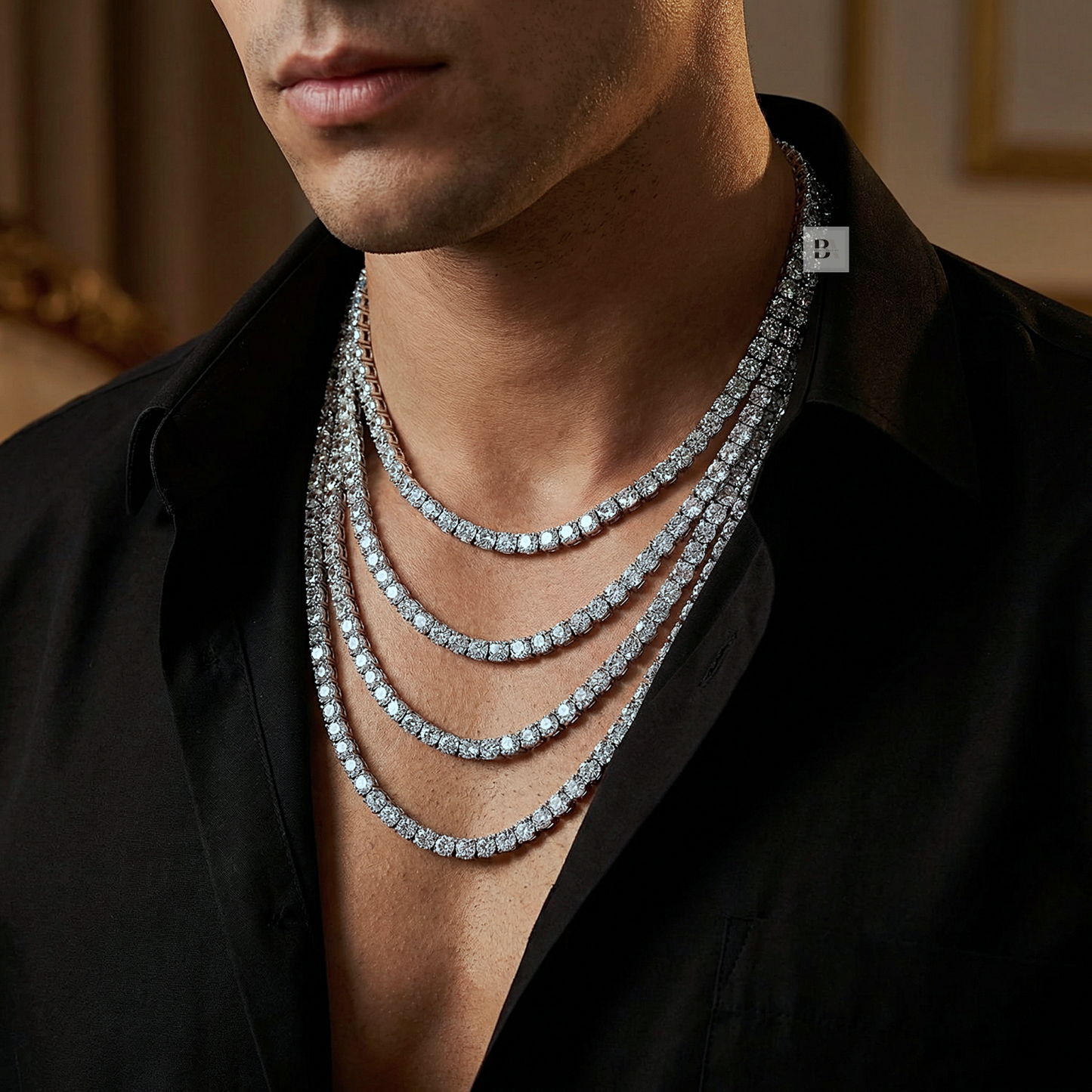 Man wearing a stack of diamond necklaces with a blurred background