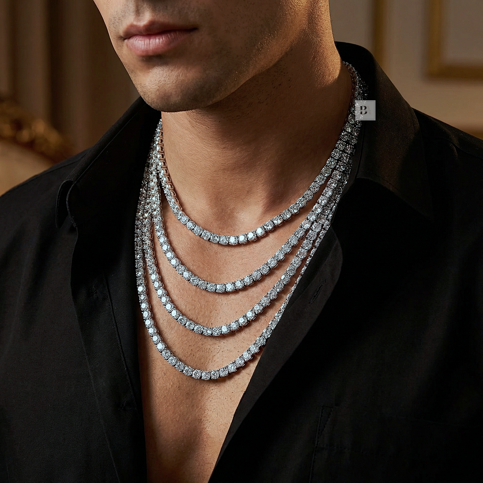 Man wearing a stack of diamond necklaces with a blurred background