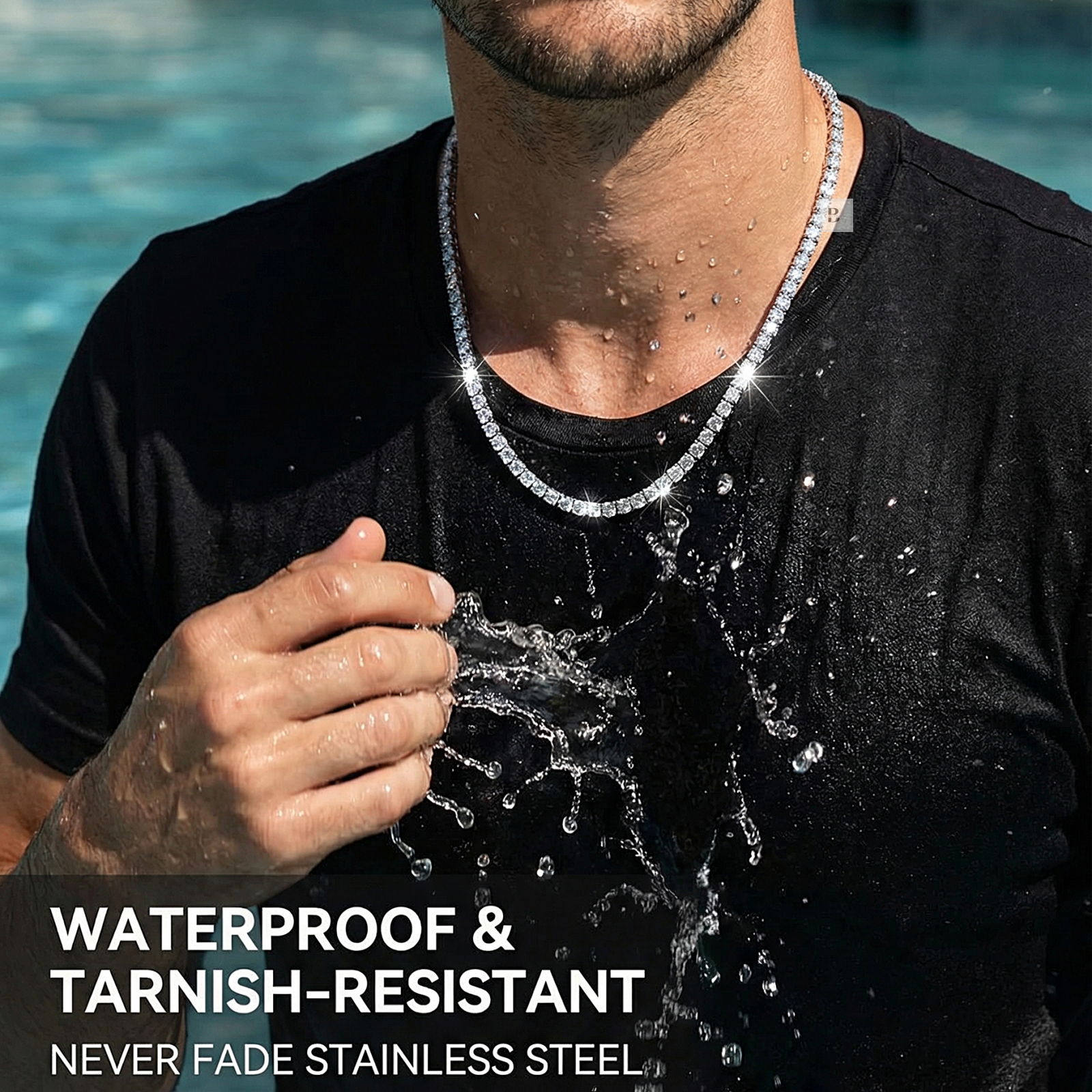 Man wearing a silver tennis necklace with water splashing on it, set against a blurred natural background.