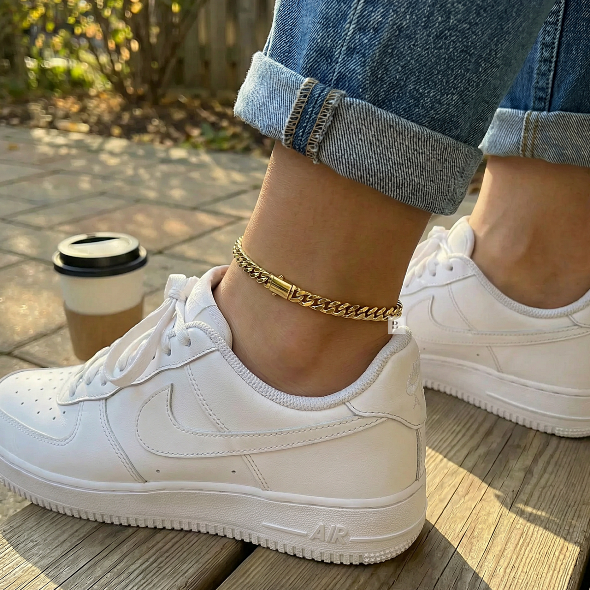 Wearing 18K Gold Plated Monaco Lock Concave Cuban Anklet in Jeans and Sneakers.