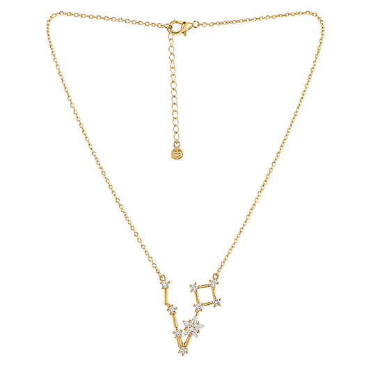 A gold chain necklace featuring a pendant composed of geometric gold frames and star-like clusters set with clear stones, displayed on a solid white background.