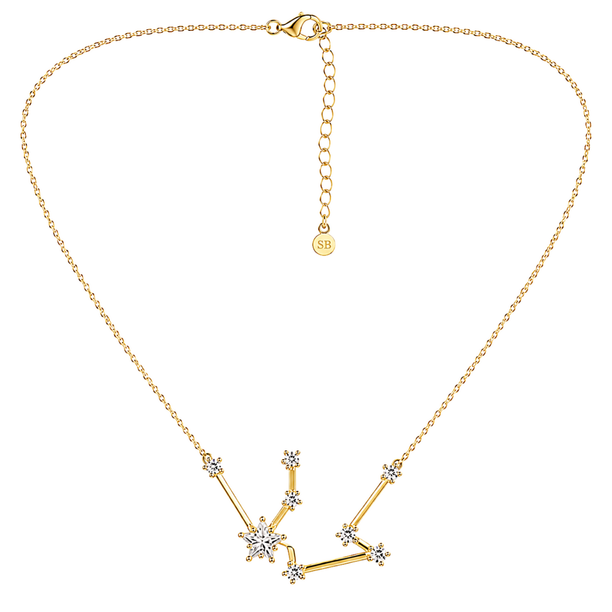A gold necklace featuring a constellation pendant adorned with clear crystals, displayed on a clean white background. The necklace includes an adjustable clasp chain with a small circular 'SB' brand tag.