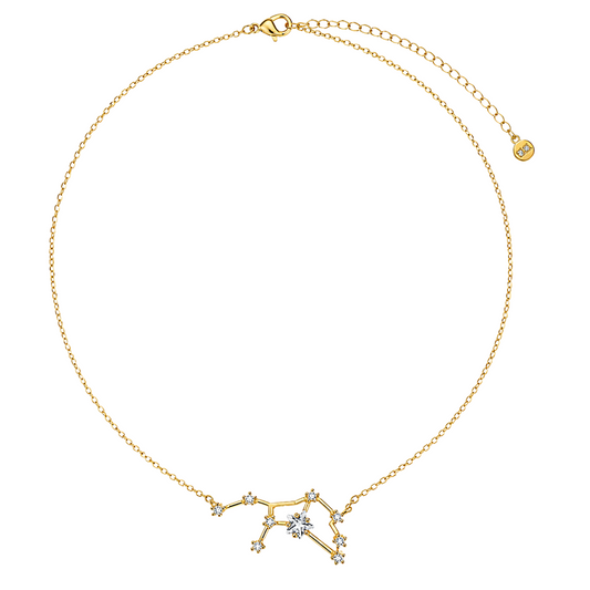 A delicate gold chain necklace with a constellation pendant featuring small clear gemstones, displayed on a clean white background.
