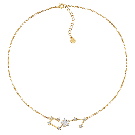 A gold chain necklace with a constellation pendant featuring clear gemstones, displayed on a clean white background.