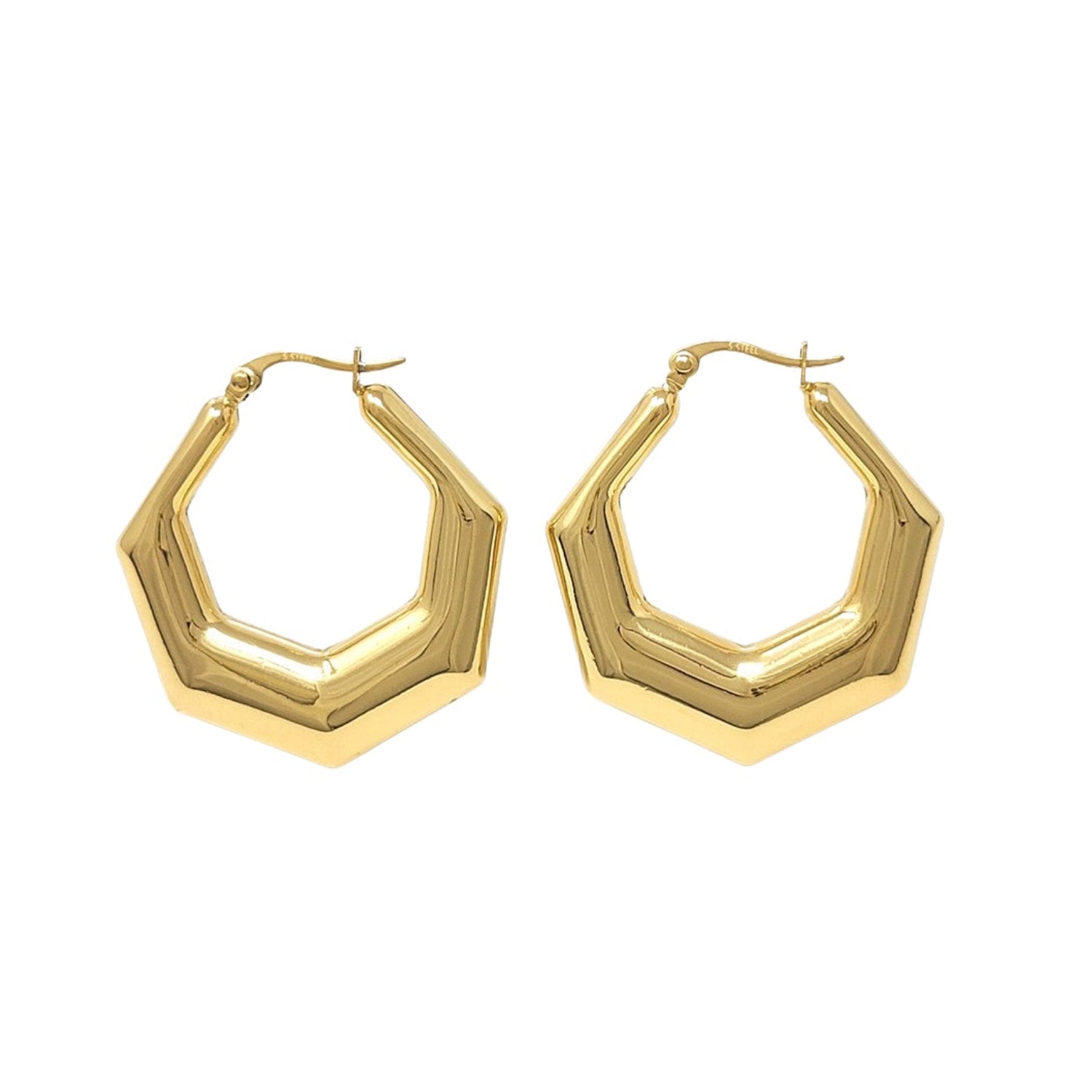 Gold hoop earrings on a white background