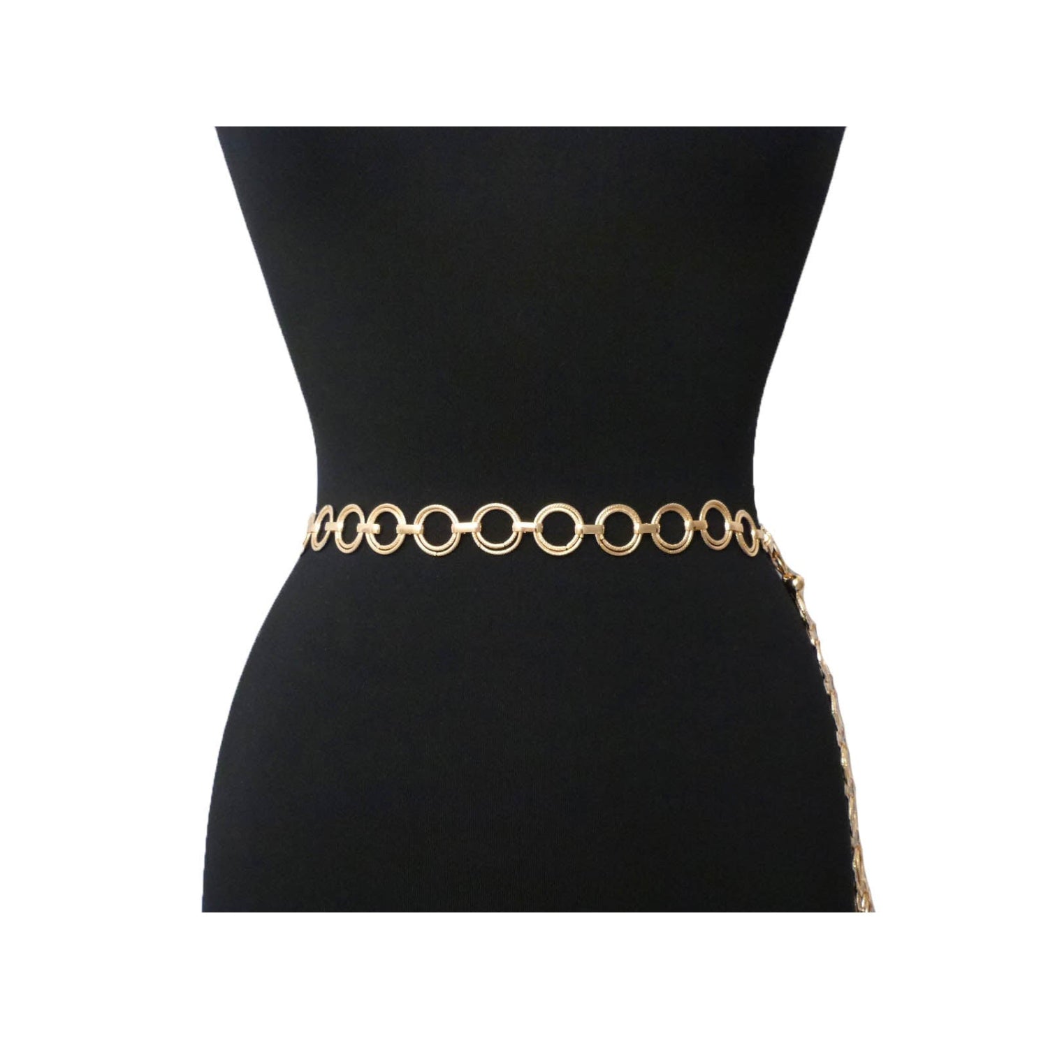 Gold chain belt on a black mannequin with a white background