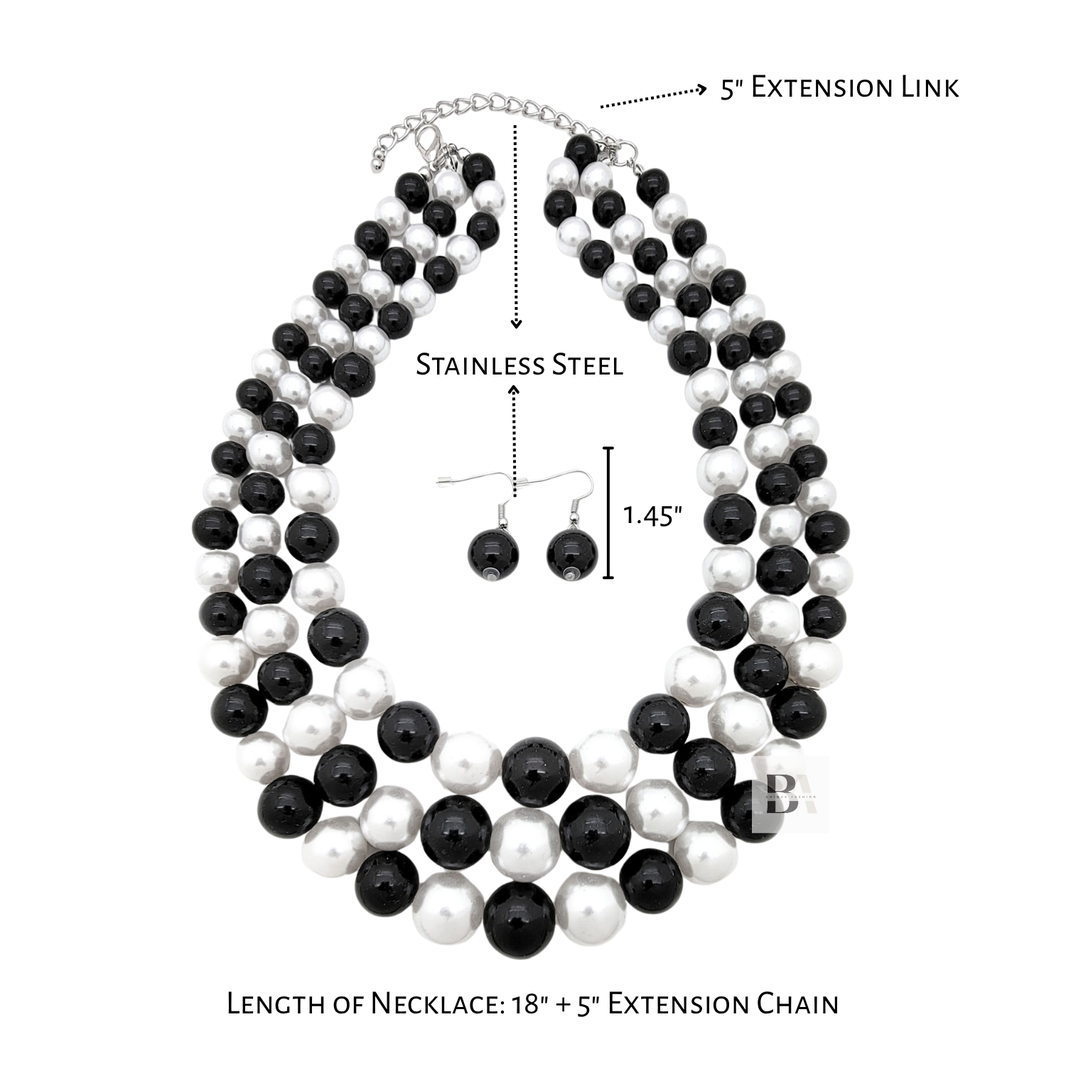 Black and white pearl necklace with extension chain and earring on a white background