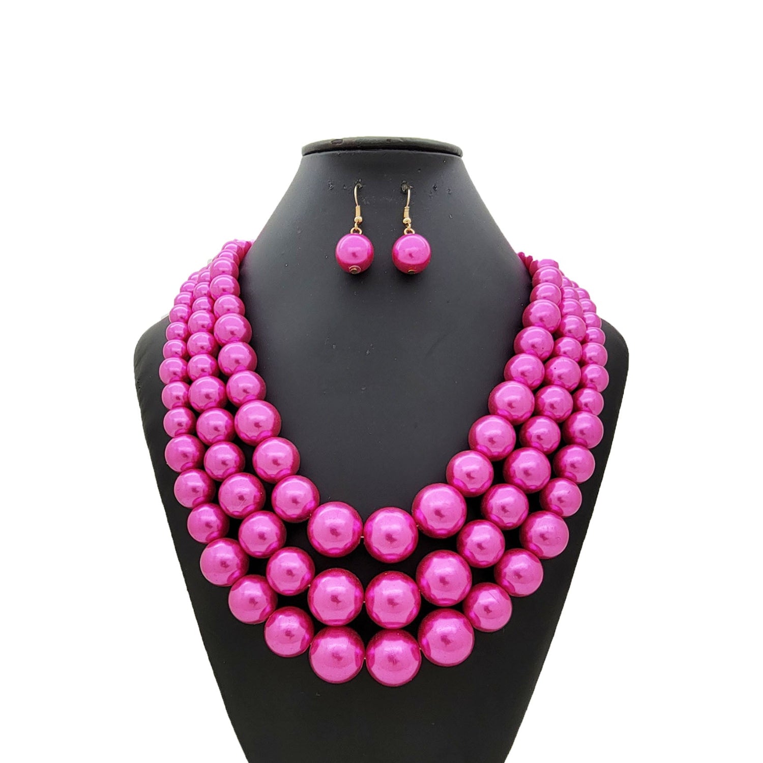 Hot Pink Pearl Necklace and earring on the display