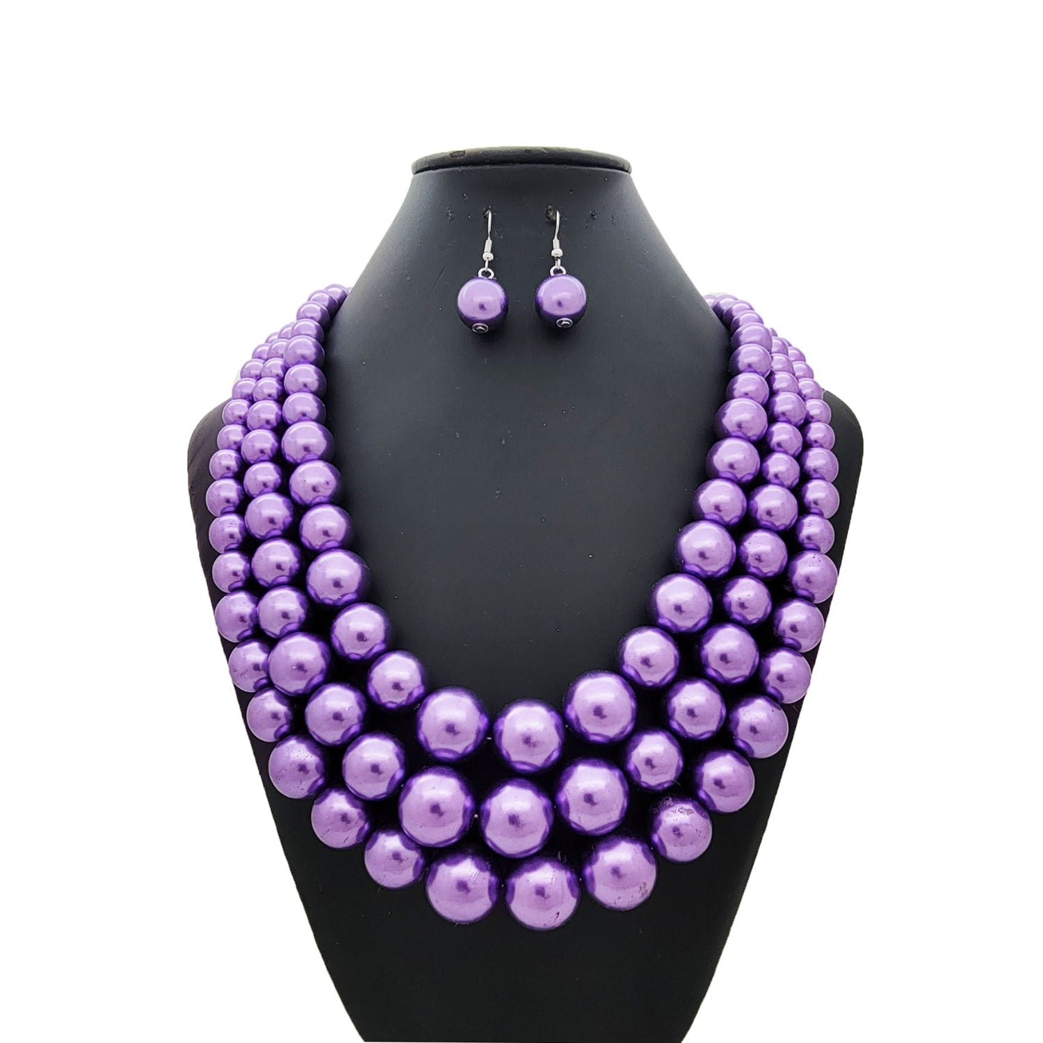 Lavender pearl necklace and earrings set on a black mannequin bust.