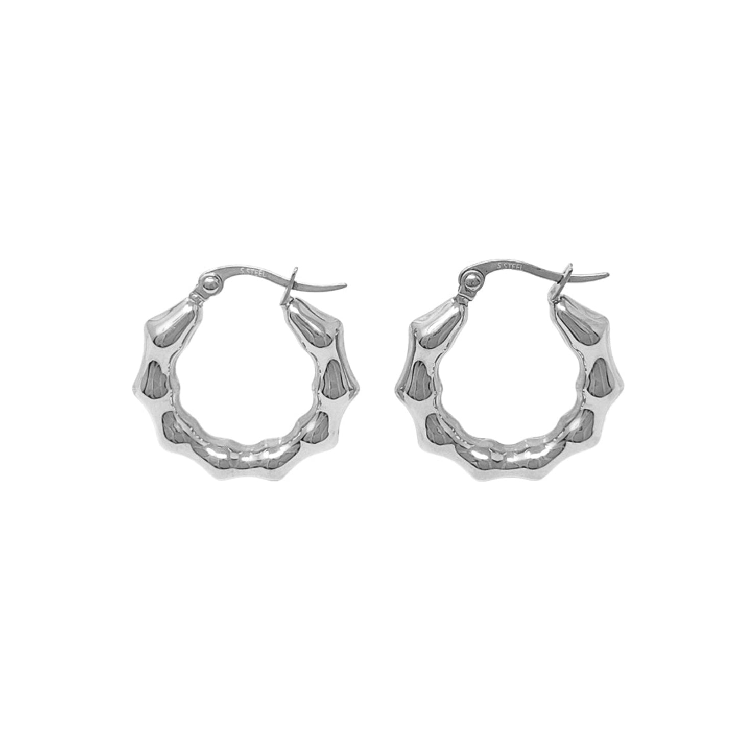 Pair of silver hoop earrings on a white background