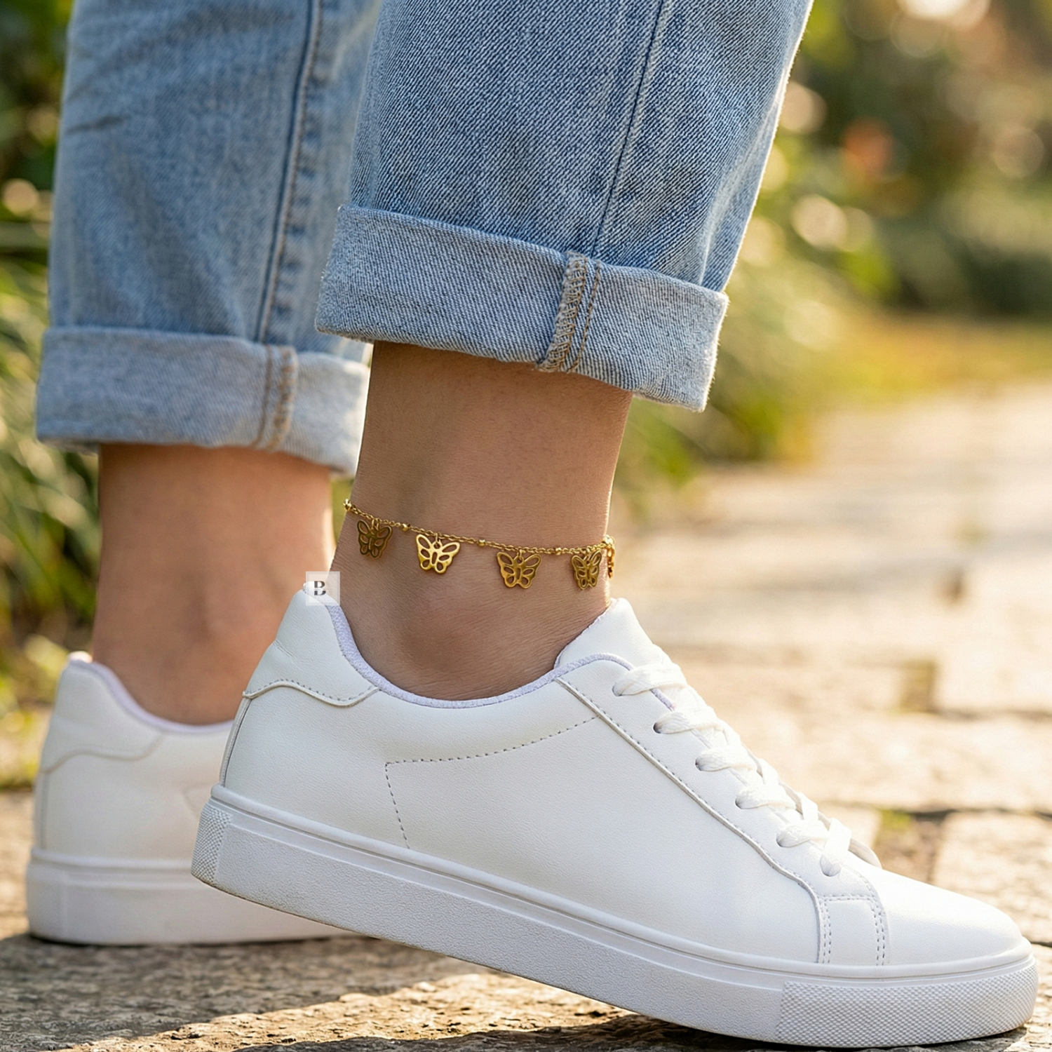 Wearing Gold butterfly charms anklet with jeans and sneakers