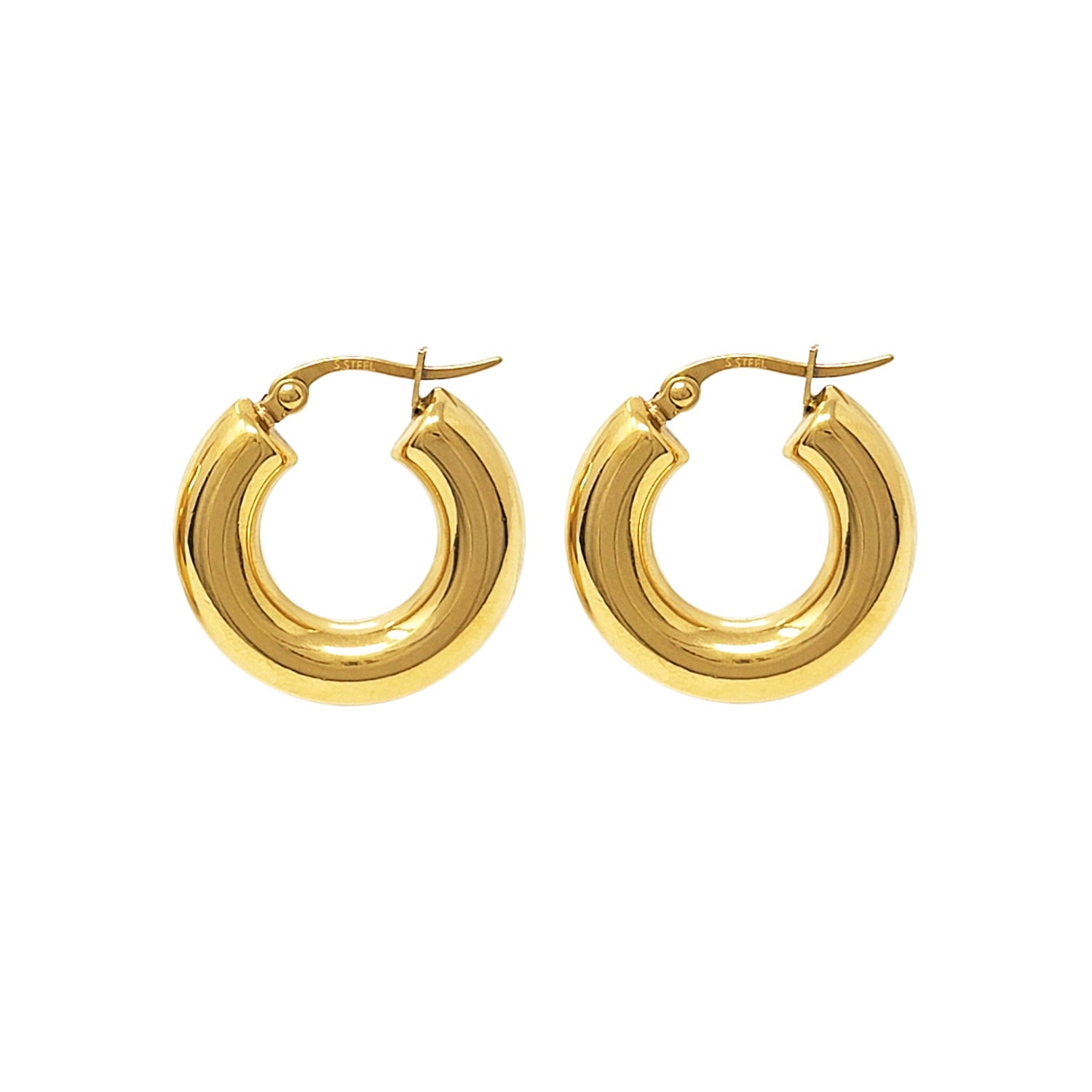 Gold hoop earrings on a white background