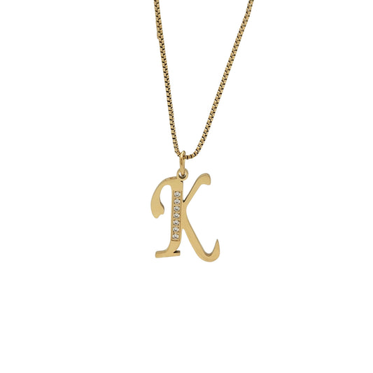 Gold necklace with a 'K' pendant on a white background