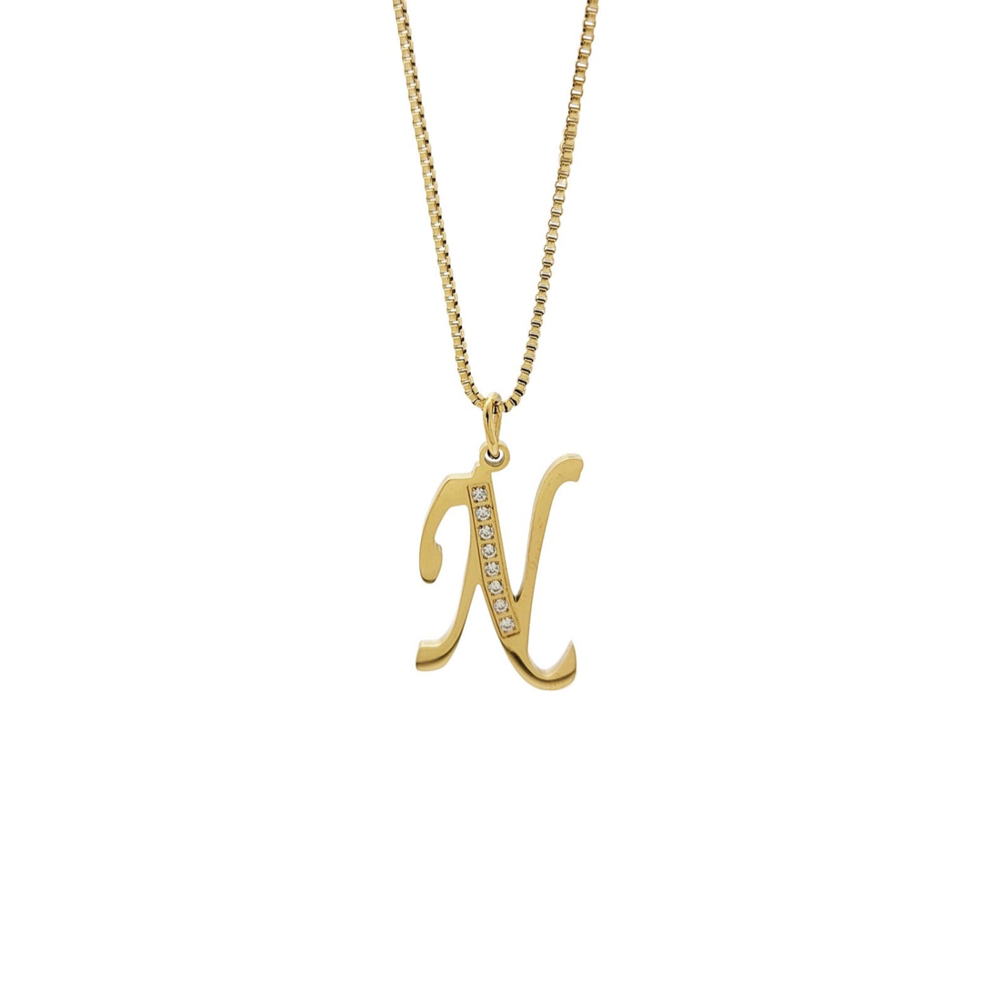 Gold necklace with a 'N' pendant on a white background