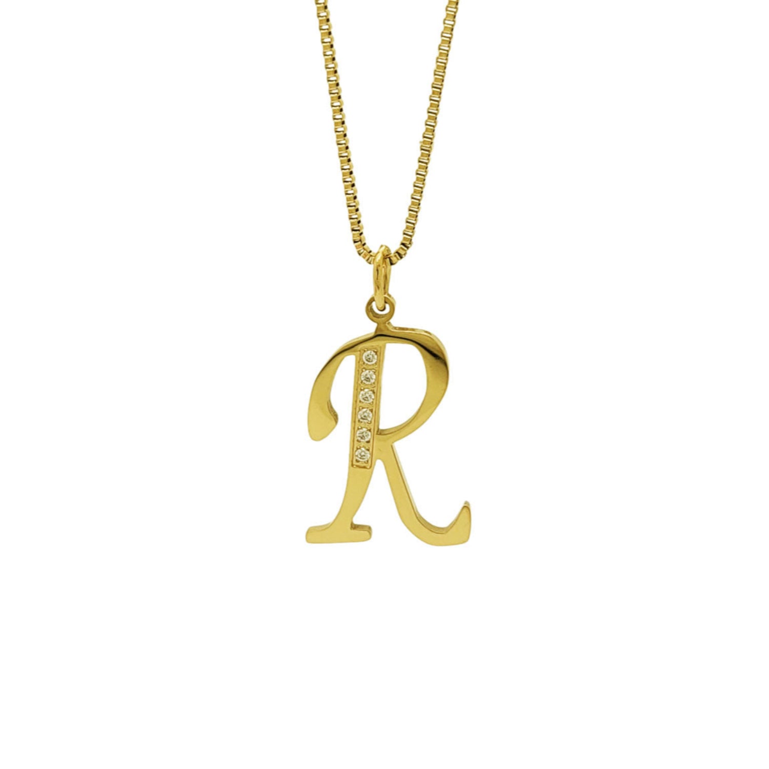 Gold necklace with a 'R' pendant on a white background