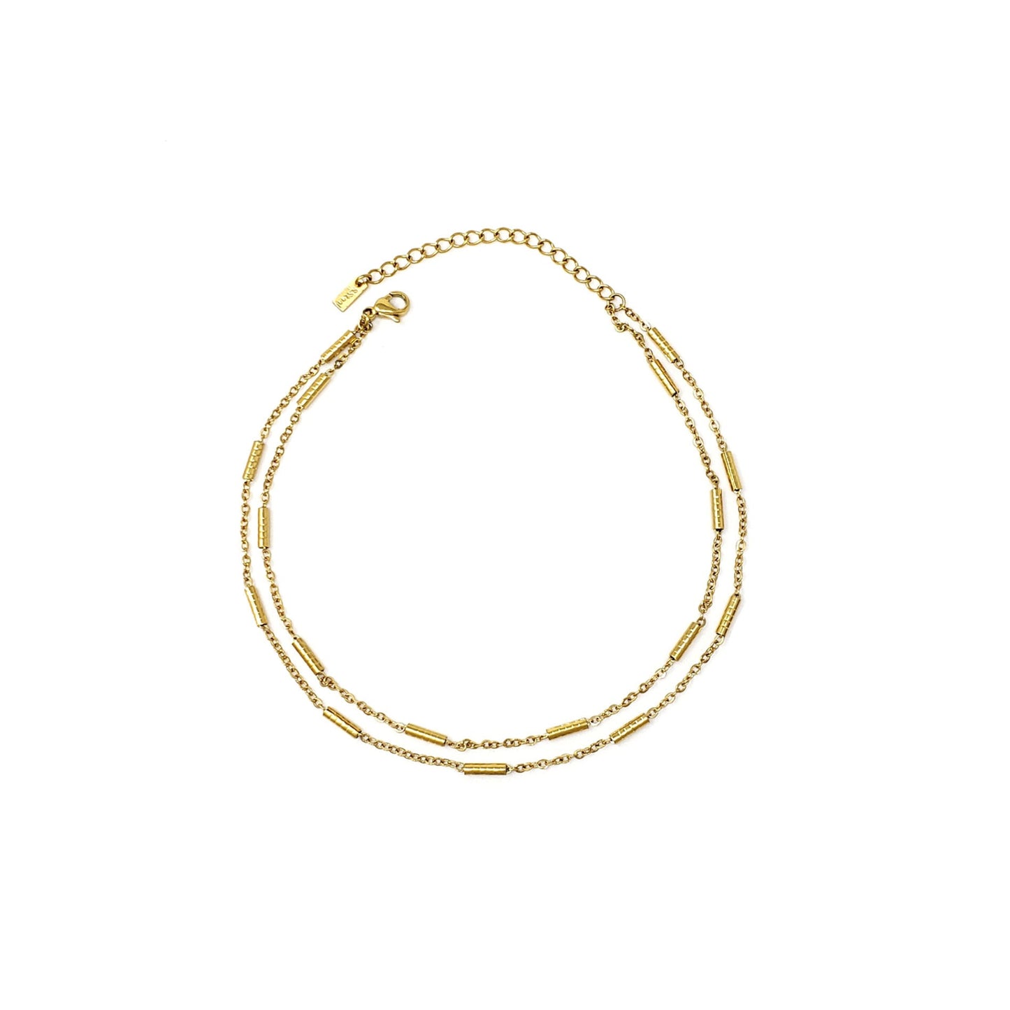 Gold necklace on a white background