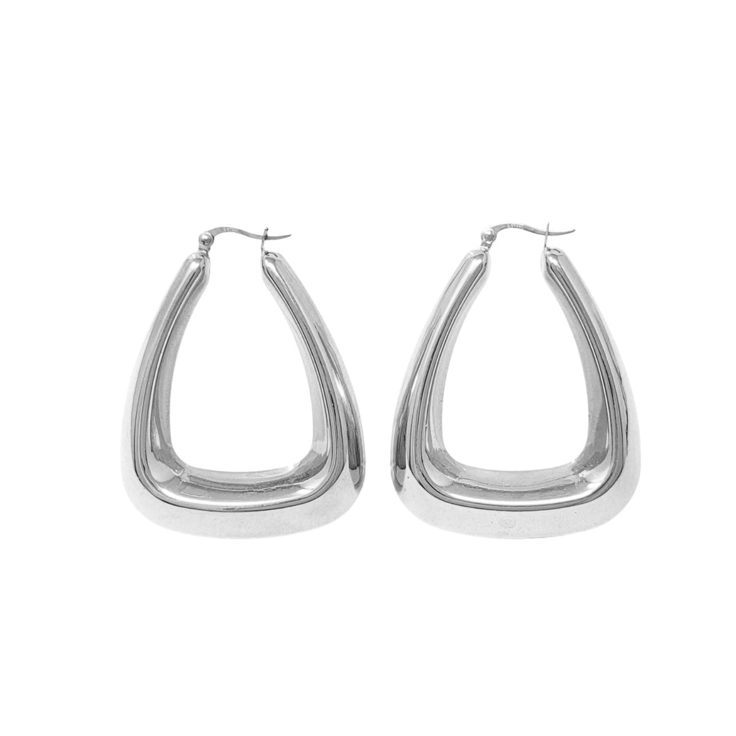 Pair of silver hoop earrings on a white background