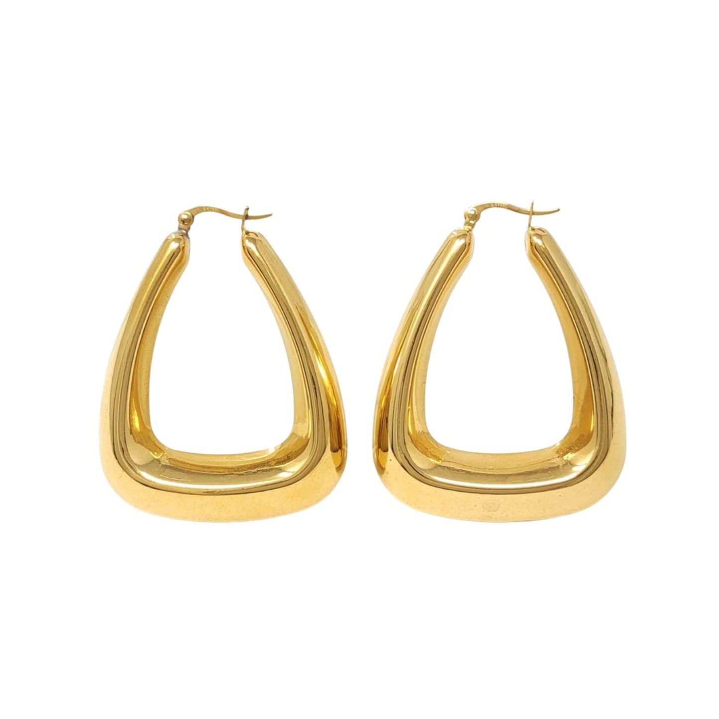 Gold hoop earrings on a white background